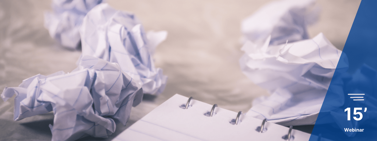 Wrinkled papers representing discarded passive voice requirements. Symbolizing the revision of requirements and importance of active voice