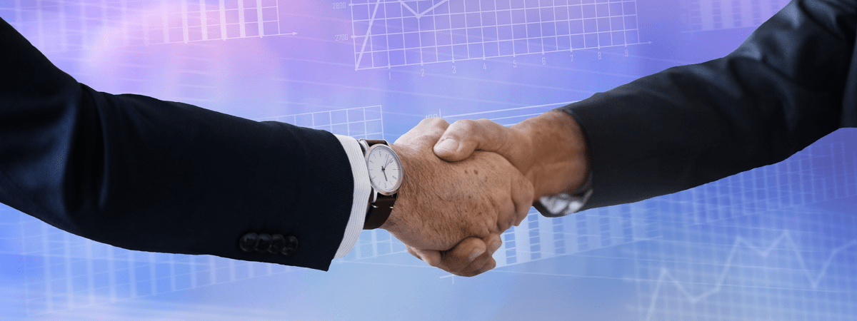 Corporate handshake to represent how SES ENGINEERING Studio supports managing data during the acquisition process, ensuring compliance.